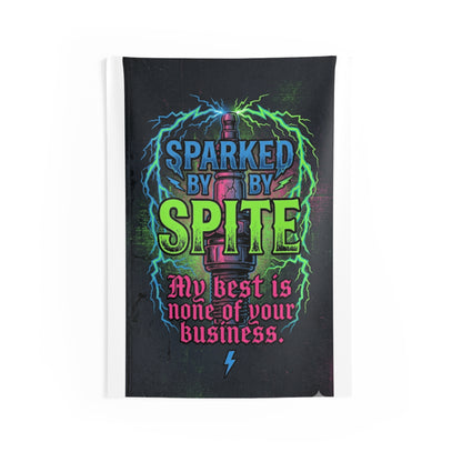 A rectangular wall tapestry featuring a dark, grunge-style graphic with the text 'SPARKED BY SPITE My best is none of your business.' in blue, green, and pink lettering, surrounded by neon lightning effects on a black background.